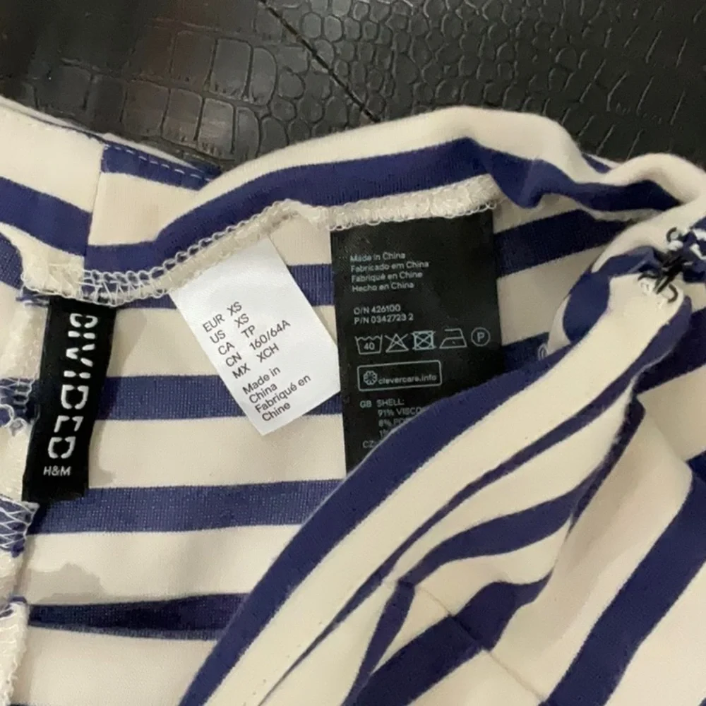 H & M DIVIDED BLUE AND WHITE STRIPED SHORTS. - Picture 2 of 4